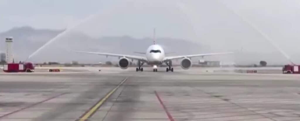 Wide-body jet receives water cannon salute